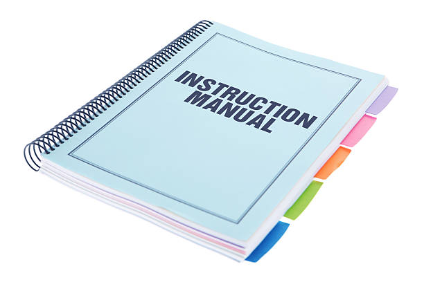 instruction manual - bound paperwork document on white - handboek stockfoto's en -beelden