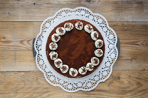 istock Tiramisu cake on raw wood rustic 504056161