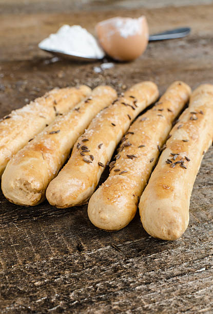 istock Homemade baked breadsticks 504057011