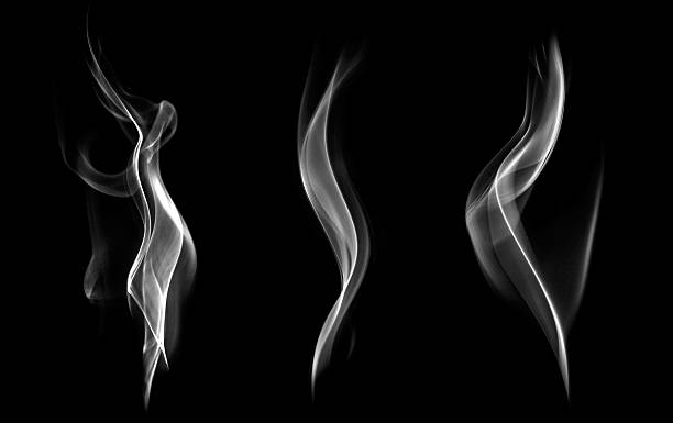 Abstract smoke isolated on black background. stock photo