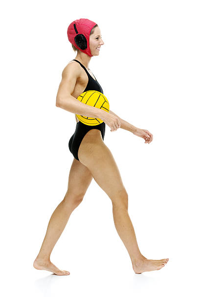 istock Smiling athlete walking & holding water polo 504057817