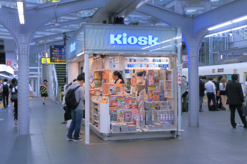 Osaka, Japan - 3 June, 2014: Commuters shop at Kiosk at JR Osaka Train station in Osaka Japan.
