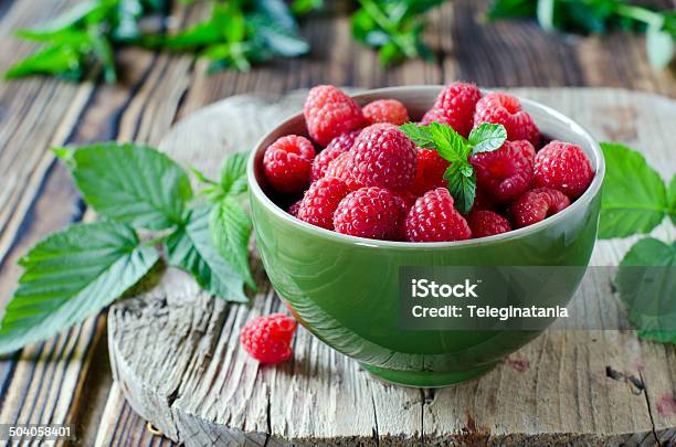Fresh Raspberries In A Bowl Stock Photo - Download Image Now - Backgrounds, Beauty, Berry Fruit