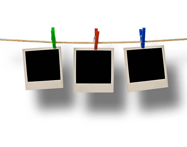 istock retro film blanks on a rope held by clothespins 504059081