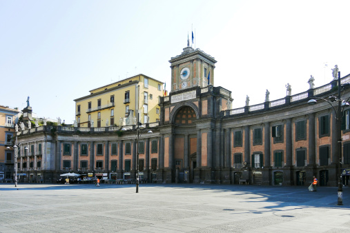 Naples, Italy - August 11, 2013: National College Vittorio Emanuele II on Piazza Dante Alighieri. The history of school begins in 1768, when Ferdinand IV of Bourbon founded the House of the Savior.