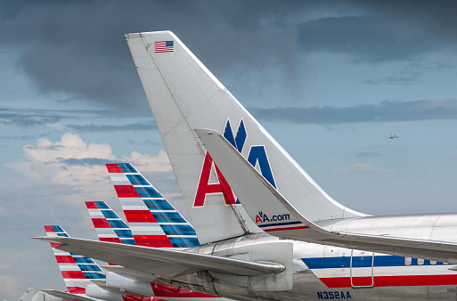 Miami, USA - July 30, 2014: The new and the old visual design of American Airlines together at Miami International Airport, Miami, Florida.