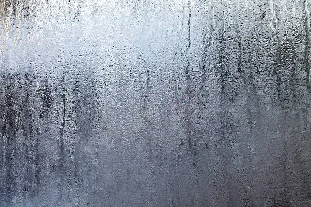 Photo of Steamy Window with Water Drops