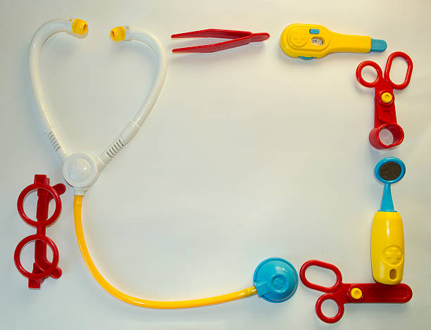 istock Background with toys medical tools and place for text 504069078