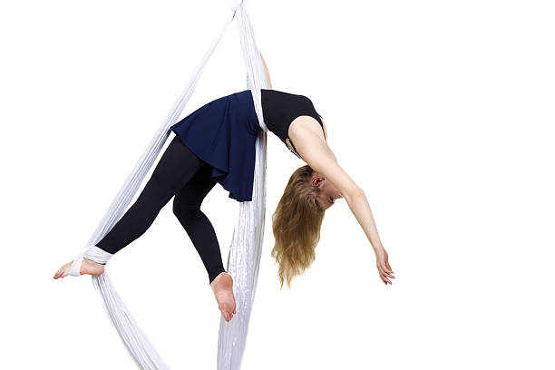 istock Athletic woman doing some tricks on silks 504070834