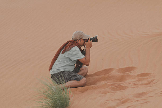 istock Professional Photographer in Dubai Desert 504072980