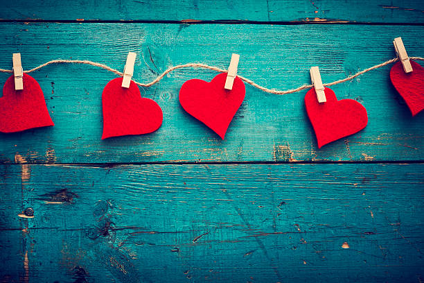 Valentines day hearts on wooden background