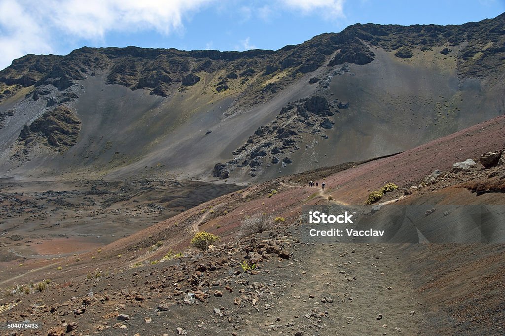 Crater with trails in Haleakala National Park on Maui Haleakala crater with trails in Haleakala National Park on Maui Island Hawaii panorama Footpath Stock Photo
