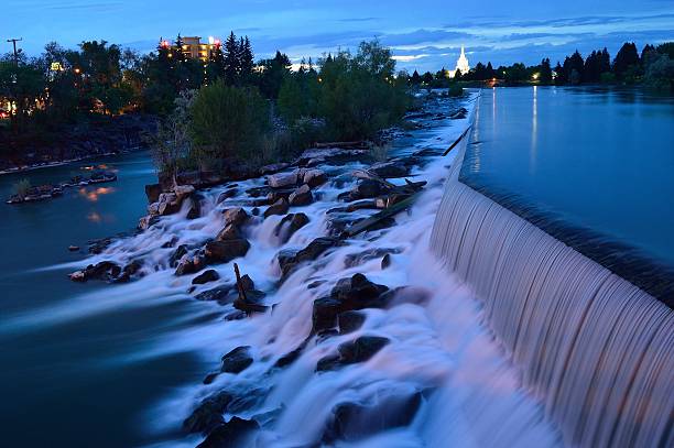 The Idaho Falls Waterfalls with the Mormon Temple in the background.