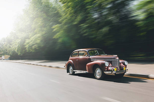 Saratov, Russia - June 21, 2015: Retro car Opel Kapitan 1930s  fast speed driving on the asphalt road in city at daytime