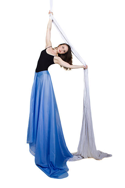 istock Athletic woman doing some tricks on silks 504077616