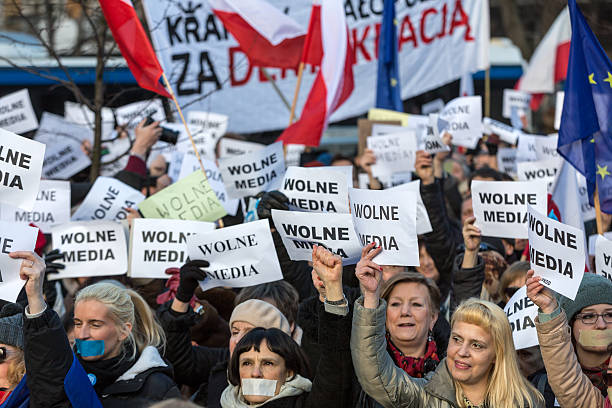 Cracow - The demonstration  of   KOD  for free media Cracow, Poland - January 9, 2016:  -  The demonstration of the Committee of the Defence  of the Democracy  KOD  for free media /wolne media/ and democracy against PIS government. Cracow , Poland solidarity labor union stock pictures, royalty-free photos & images