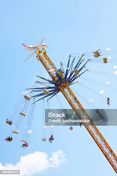 On Chairoplane Up In Sky Stock Photo - Download Image Now - Chain - Object, Chain Swing Ride, Düsseldorf