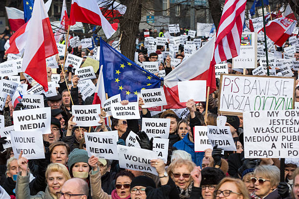 Cracow - The demonstration  of   KOD  for free media Cracow, Poland - January 9, 2016:  -  The demonstration of the Committee of the Defence  of the Democracy  KOD  for free media /wolne media/ and democracy against PIS government. Cracow , Poland solidarity labor union stock pictures, royalty-free photos & images