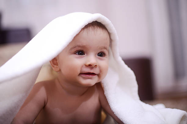 istock Smiling baby after shower 504085370