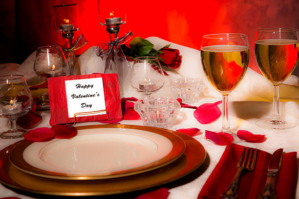 istock Valentine's Day dinner. Romantic table place setting. Card on plate. 504096264
