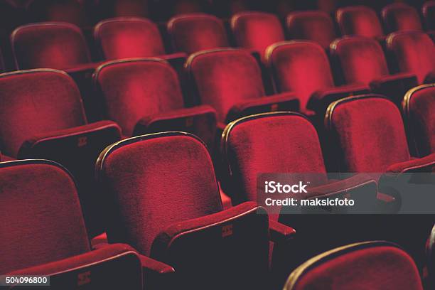 Empty Comfortable Red Seats With Numbers In Cinema Stock Photo - Download Image Now - Movie Theater, Theatrical Performance, Stage Theater