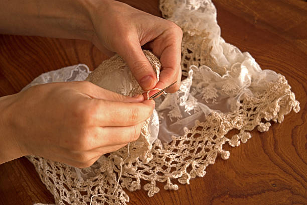 istock Women hand with knitting scarf 504097786