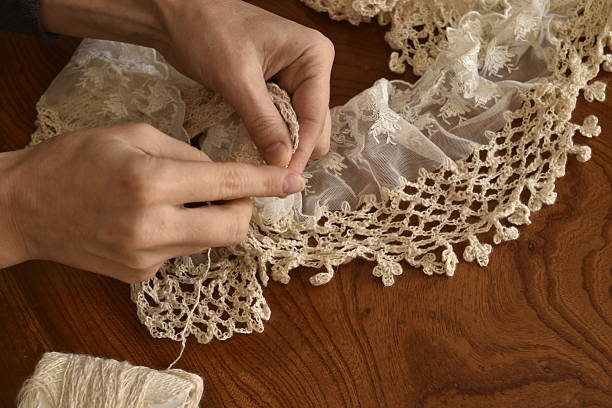 istock Women hand with knitting scarf 504097838