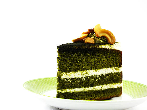green tea cake with cream and cashew nut