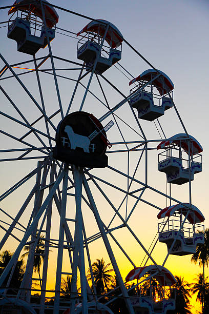 istock Stock Photo: Vintage Retro Ferris Wheel on Blue Sky 504099736