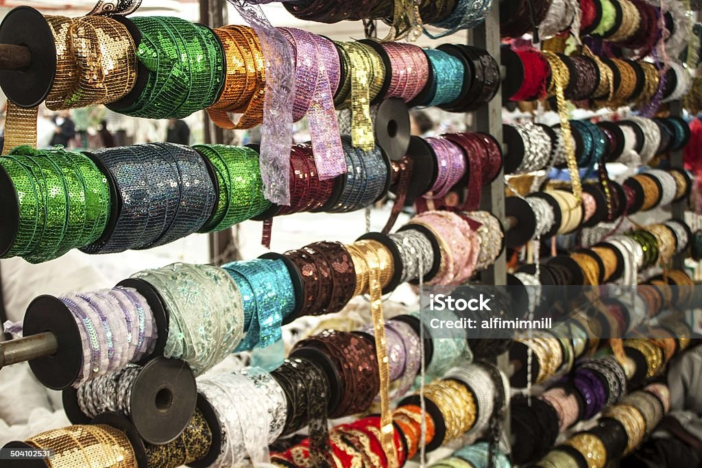 Colorful ribbons on bobbins Multi-coloured ribbons on bobbins Art And Craft Stock Photo