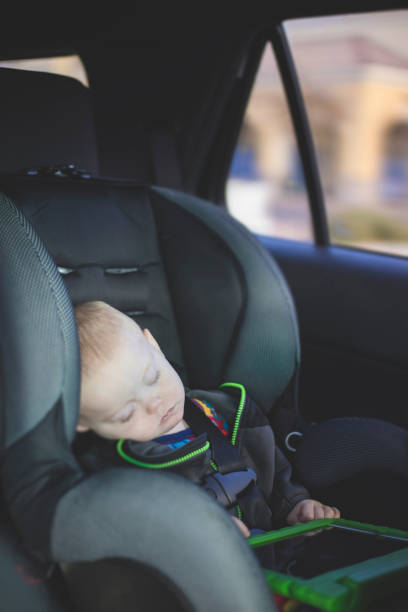 istock Baby sleeping in car seat 504102534