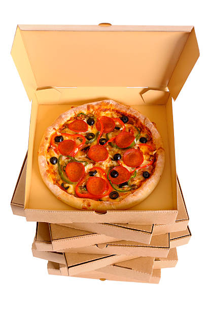istock Pizza on a stack of delivery boxes isolated on white 504103322