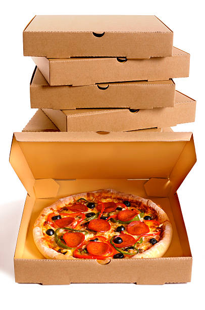 istock Freshly baked Pizza with stack of delivery boxes 504103468