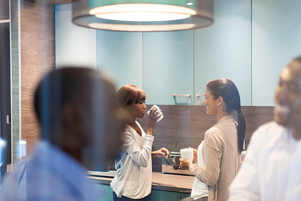 African business colleagues having coffee together. stock photo