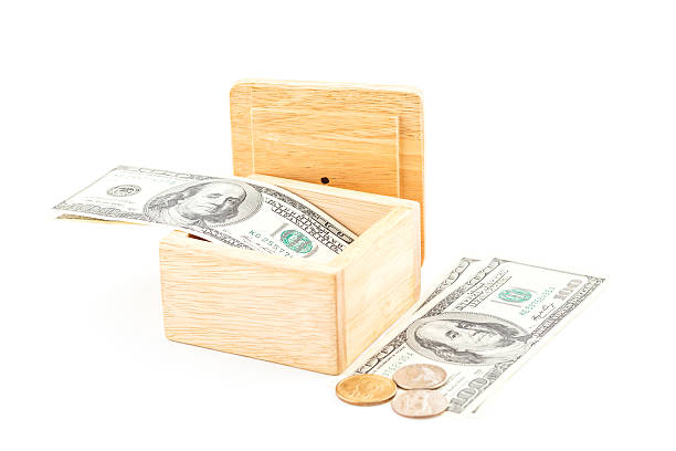 istock Saving by dollar and coin with wooden box 504103891