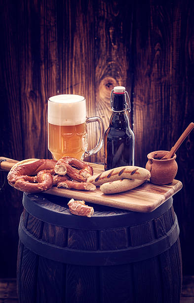 Sausages and Beer Traditional german sausages with pretzles and beer oktoberfest beer stock pictures, royalty-free photos & images