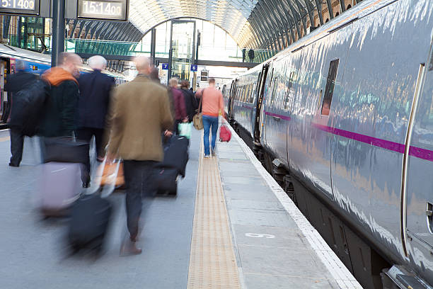 istock Blur Movement people in Rush Hour train station, London, UK 504105235