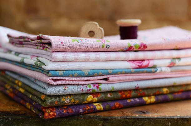 istock Pile of floral pattern textile in shabby style 504106019
