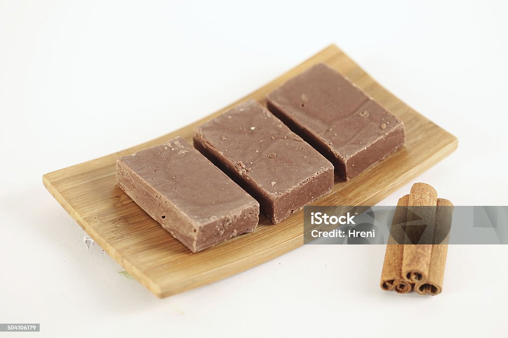 Delicious chocolate with cinnamon sticks on plate Antioxidant Stock Photo