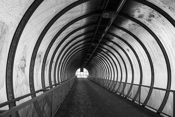 istock Light at the end of tunnel black and white. 504107448
