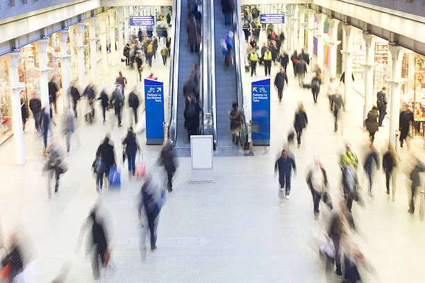 istock Blur Movement people in Rush Hour train station, London, UK 504107815