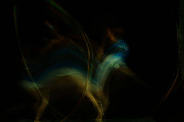 istock Rhythmic gymnasts blur woman on a black background 504110176