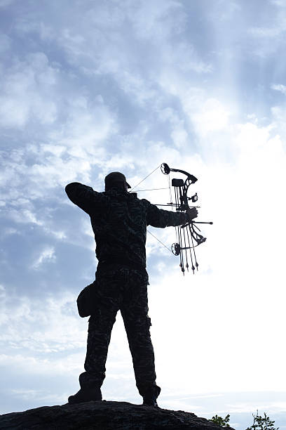 istock Profile of bowman with bow and arrow. 504111616