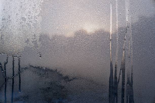 istock fantastic abstract pattern frozen water on a glass 504112276
