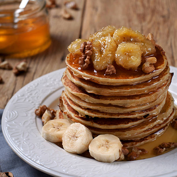 istock pancake with caramelized bananas, nuts and honey 504119140