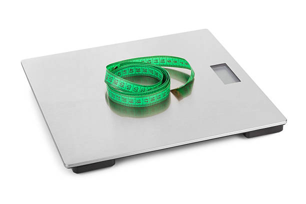 istock Measuring tape and weight scale 504120130