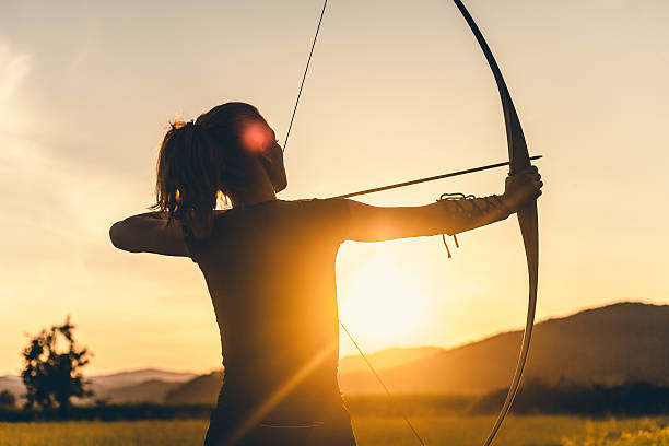 istock Woman shooting with the longbow 504121866