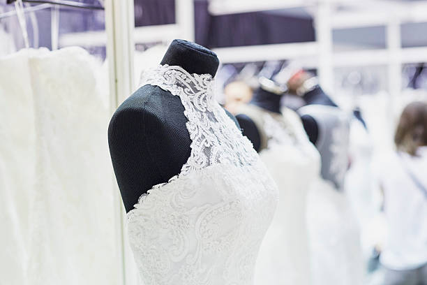 istock Beautiful wedding dresses on mannequins 504124404