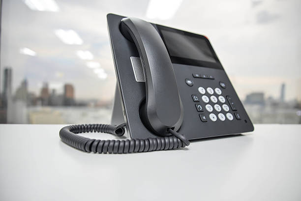 istock IP Phone - New office phone technology 504125368