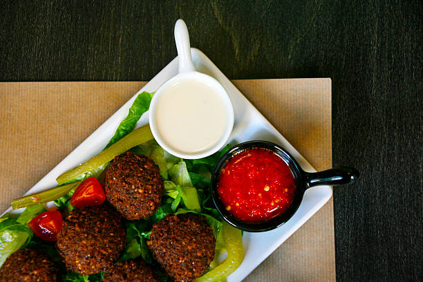 istock Roasted meatballs in plate with sauces 504125548